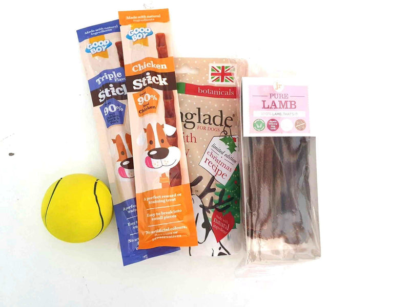 Gift Wrapped Christmas Bundles for pets with treats and toys.