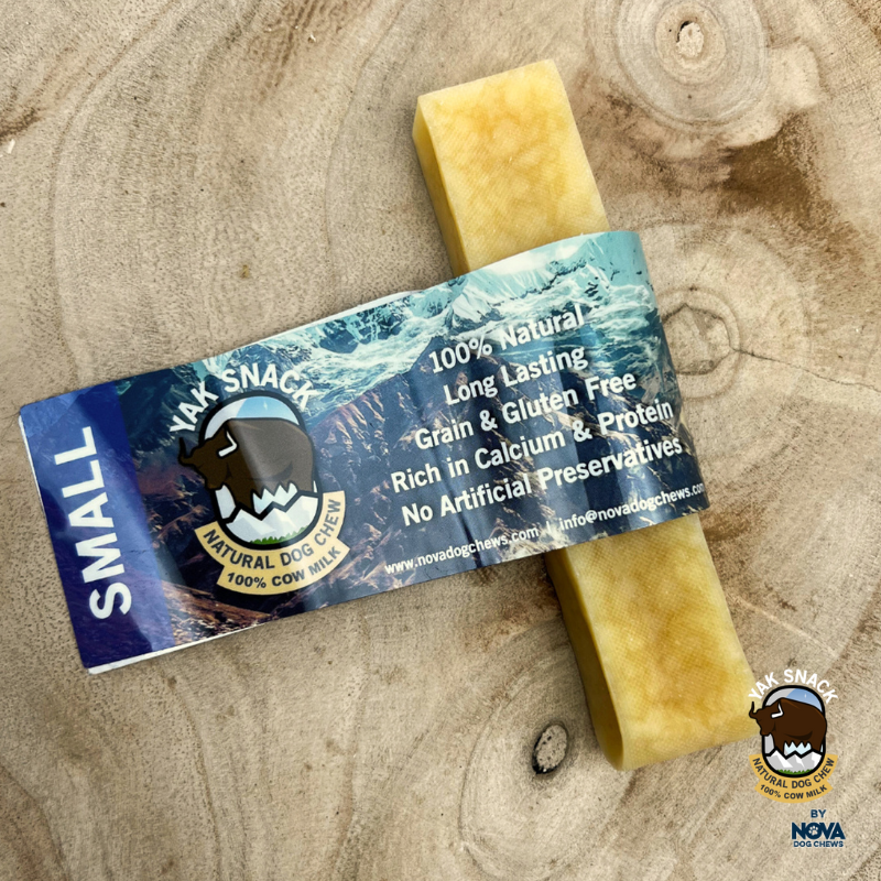 Yak Snack Natural Dog Chew on wooden surface, 100% natural and protein-rich.