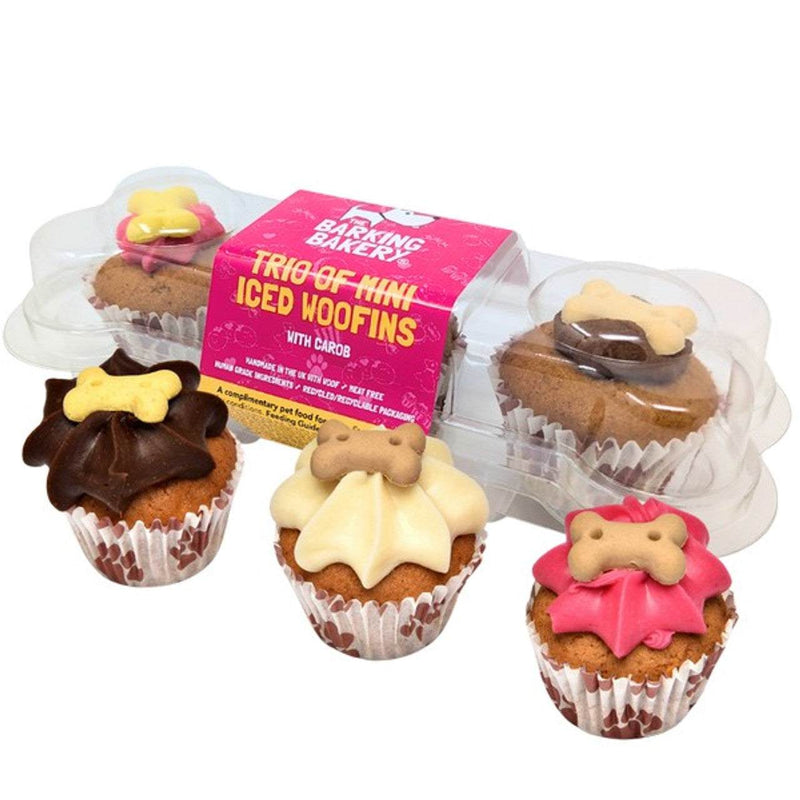 Barking Bakery Trio of Mini Iced Woofins dog treats in vanilla, carob, and pink icing with bone-shaped toppers in clear recyclable packaging