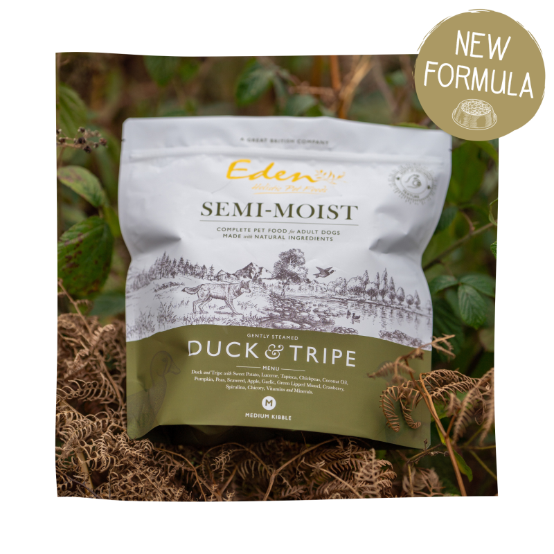 Eden Duck and Tripe Semi Moist Dog Food packaging outdoors showcasing new formula.