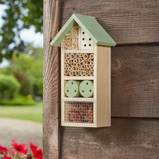 Bug & Bee Home FSC1 insect house with wood and bamboo construction on outdoor wall.