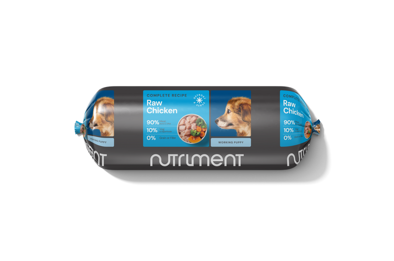 Nutriment Raw Puppy Formula Dog Food packaging with raw chicken and vegetables, complete nutrition for puppies.