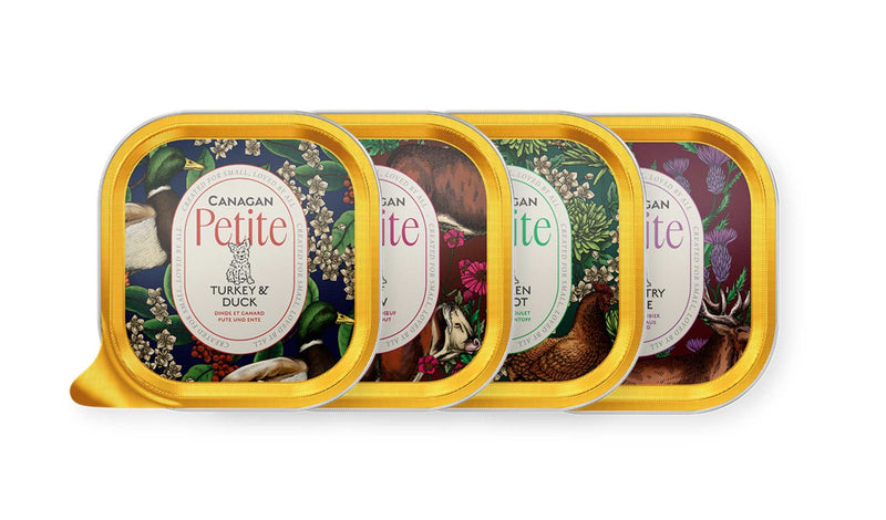 Canagan Petite Pate Multi Pack for Small Dogs, featuring Turkey & Duck, Chicken Hotpot, Country Game, and Beef Stew trays.
