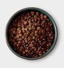 McAdams Chicken Medium Breed grain-free dry dog food with slow-roasted British free-range chicken in black bowl