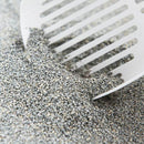 Close-up of grey clumping Intersand Odourlock unscented cat litter with scoop in 6kg bag