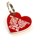 Red heart-shaped pet ID tag with engraved owner information and phone number