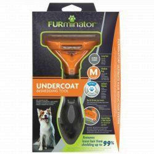 Furminator Undercoat Deshedding Tool for Dogs in packaging with ergonomic handle.