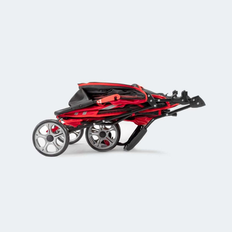 Folded Innopet All Terrain Buggy Dog Stroller with reflective safety stripes and compact design.