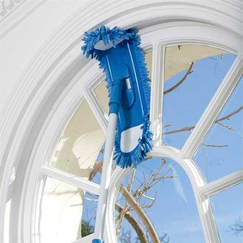JML Microfibre Mop cleaning window with flexible head.