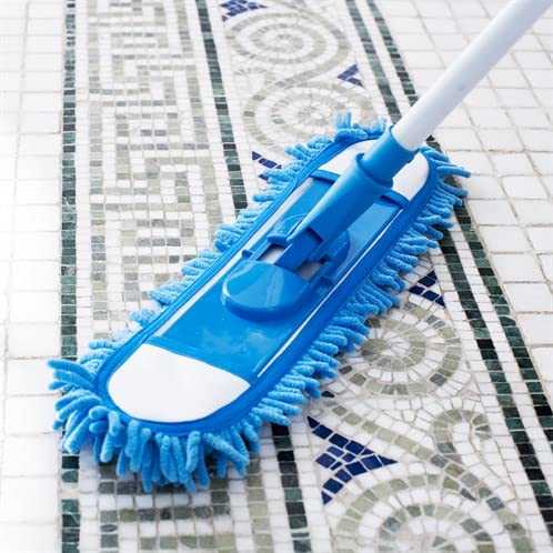 JML Microfibre Mop with blue flexible cleaning head on tiled floor.