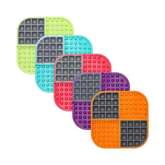 Lickimat Slomo Dog Pet Treat Dispenser in various colors, designed to slow down feeding and encourage licking for dogs and cats.