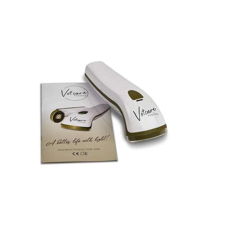Photizo Vetcare Red Light Therapy Unit with instruction manual for animal pain and skin treatment.