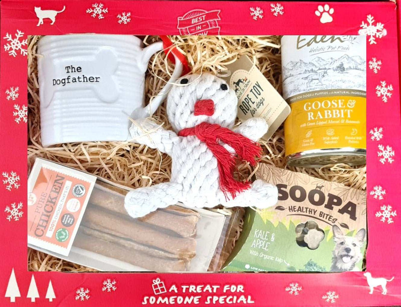 Deluxe Christmas Dog Hamper with snowman toy, dog treats, gourmet dinner, and mug.